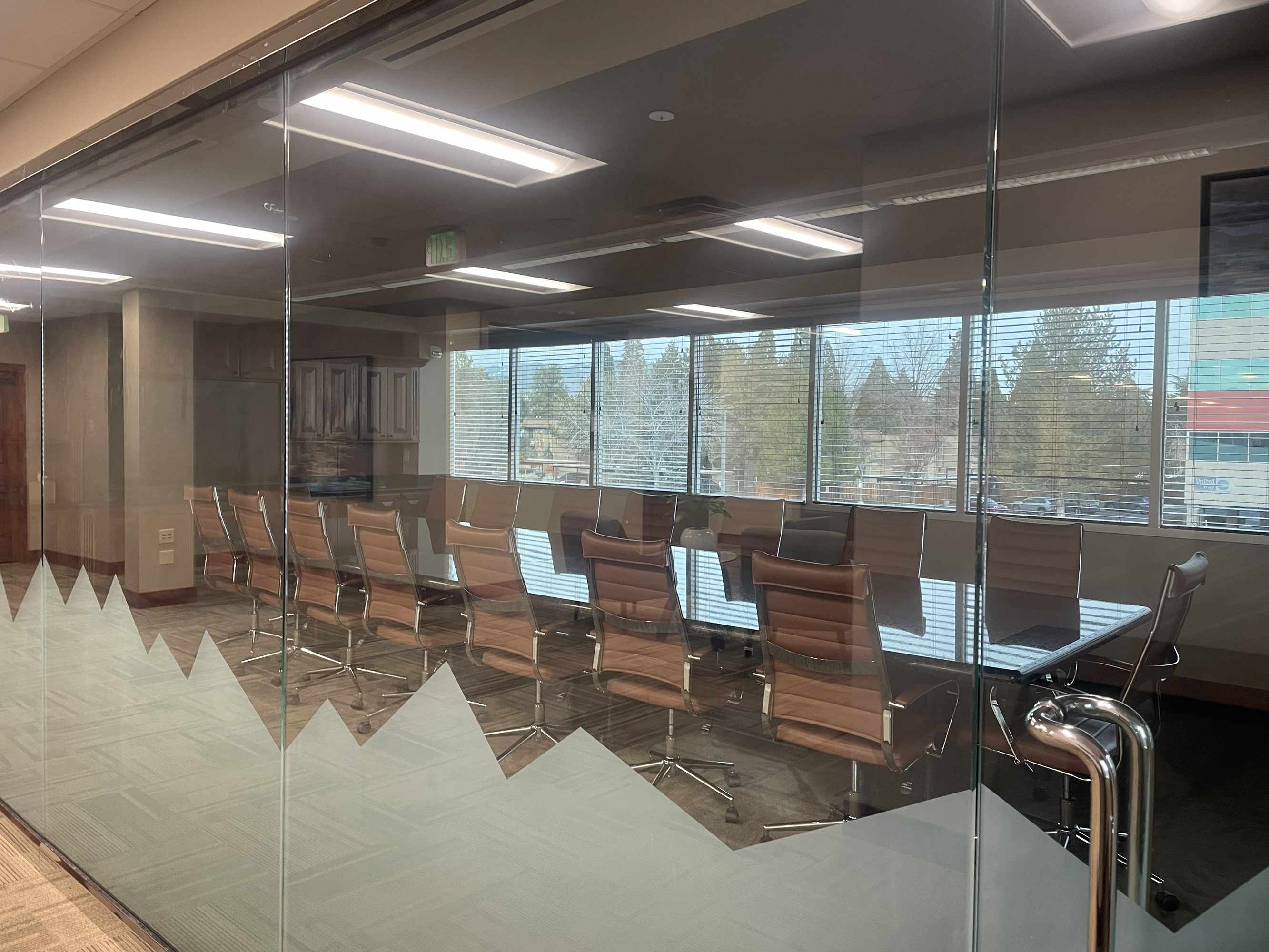 Conference room with mountain frosted windows