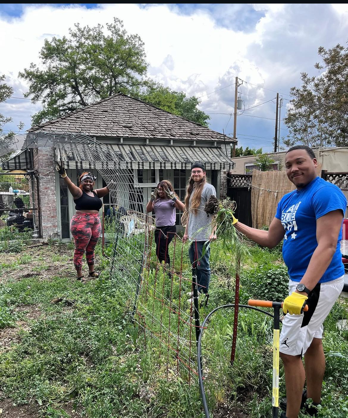 Volunteers hard at work in the garden